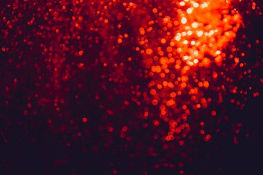 Siyah arkaplan ile soyut kırmızı bokeh lüksü