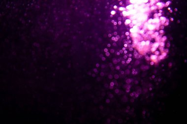 Soyut mor bokeh simli ışıklar odaklanmamış arkaplan