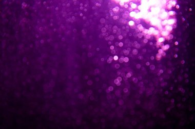 Soyut mor bokeh simli ışıklar odaklanmamış arkaplan