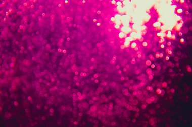 Siyah arkaplanı olan soyut pembe bokeh lüksü