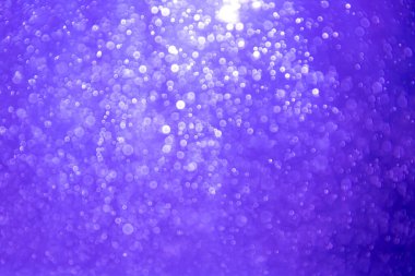 Soyut mor bokeh simli ışıklar odaklanmamış arkaplan