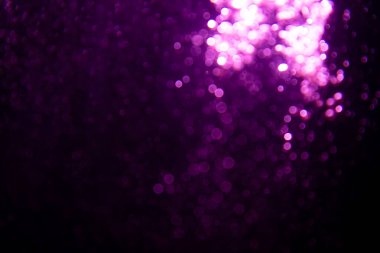 Soyut mor bokeh simli ışıklar odaklanmamış arkaplan