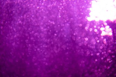 Soyut mor bokeh simli ışıklar odaklanmamış arkaplan