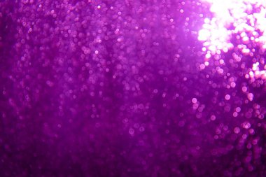 Soyut mor bokeh simli ışıklar odaklanmamış arkaplan