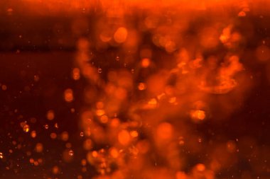 Siyah arkaplanda kırmızı ışık bokeh