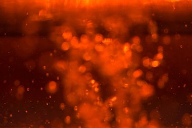 Siyah arkaplanda kırmızı ışık bokeh