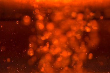 Siyah arkaplanda kırmızı ışık bokeh