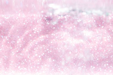 Pembe soyut ışıltılar ya da parlak ışıklar Odaklanmış daireler bokeh arkaplan