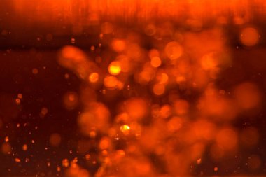 Siyah arkaplanda kırmızı ışık bokeh