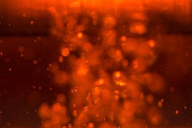 Siyah arkaplanda kırmızı ışık bokeh