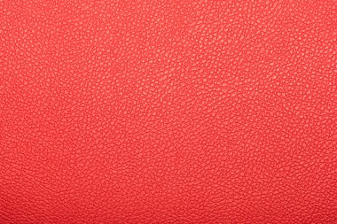 Kırmızı deri görünüm detayı ve dokusu arkaplan olarak kullanmak için uygun