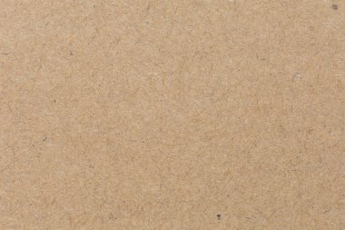 Eski kahverengi kağıt dokusunu kapat. Arkaplan resimleri veya reklamlar için dekorasyon olarak kullanılacak kağıt lifleri.