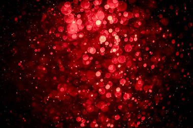 Görünür kırmızı noktalı bulanık fotoğraf, ışıl ışıl parlıyor. Duvar kağıdı olarak kullanılabilecek kadar lüks görünüyor.