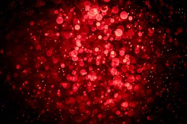 Görünür kırmızı noktalı bulanık fotoğraf, ışıl ışıl parlıyor. Duvar kağıdı olarak kullanılabilecek kadar lüks görünüyor.