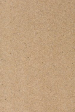 Eski kahverengi kağıt dokusunu kapat. Arkaplan resimleri veya reklamlar için dekorasyon olarak kullanılacak kağıt lifleri.