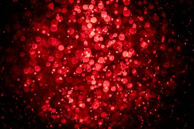 Görünür kırmızı noktalı bulanık fotoğraf, ışıl ışıl parlıyor. Duvar kağıdı olarak kullanılabilecek kadar lüks görünüyor.