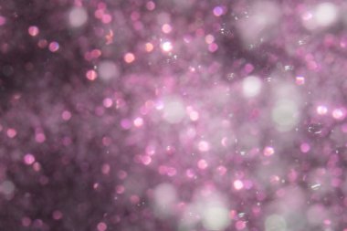 Siyah arkaplanı olan soyut pembe bokeh lüksü