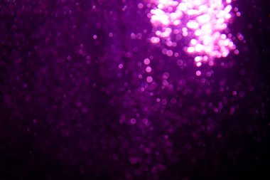 Soyut mor bokeh simli ışıklar odaklanmamış arkaplan