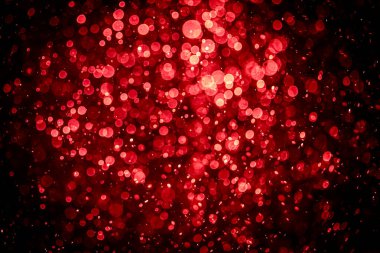 Görünür kırmızı noktalı bulanık fotoğraf, ışıl ışıl parlıyor. Duvar kağıdı olarak kullanılabilecek kadar lüks görünüyor.