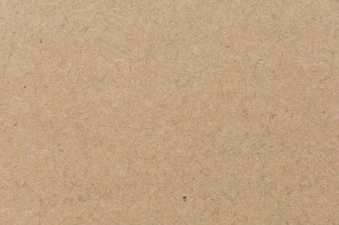 Eski kahverengi kağıt dokusunu kapat. Arkaplan resimleri veya reklamlar için dekorasyon olarak kullanılacak kağıt lifleri.