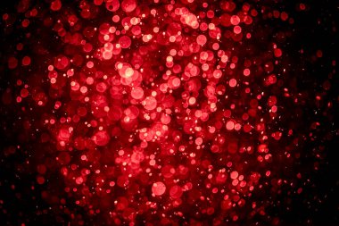 Görünür kırmızı noktalı bulanık fotoğraf, ışıl ışıl parlıyor. Duvar kağıdı olarak kullanılabilecek kadar lüks görünüyor.