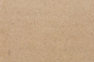 Eski kahverengi kağıt dokusunu kapat. Arkaplan resimleri veya reklamlar için dekorasyon olarak kullanılacak kağıt lifleri.