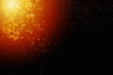 Görünür altın noktalı bulanık fotoğraf ışıl ışıl parlıyor. Lüks ve zevki gösteren bir duvar kağıdı olarak kullanılabilecek kadar lüks görünüyor..