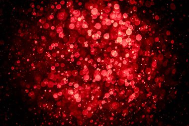 Görünür kırmızı noktalı bulanık fotoğraf, ışıl ışıl parlıyor. Duvar kağıdı olarak kullanılabilecek kadar lüks görünüyor.