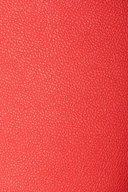 Kırmızı deri görünüm detayı ve dokusu arkaplan olarak kullanmak için uygun