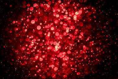 Görünür kırmızı noktalı bulanık fotoğraf, ışıl ışıl parlıyor. Duvar kağıdı olarak kullanılabilecek kadar lüks görünüyor.