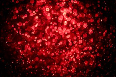 Görünür kırmızı noktalı bulanık fotoğraf, ışıl ışıl parlıyor. Duvar kağıdı olarak kullanılabilecek kadar lüks görünüyor.