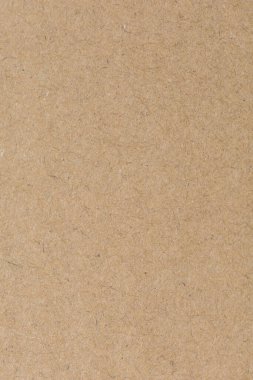 Eski kahverengi kağıt dokusunu kapat. Arkaplan resimleri veya reklamlar için dekorasyon olarak kullanılacak kağıt lifleri.