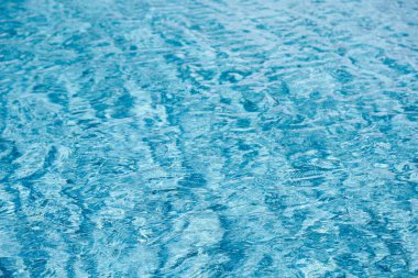 Yüzme havuzunda soyut mavi renk su dalgası arkaplan için saf doğal girdap desen dokusu kullanımı