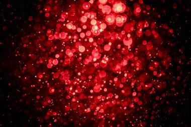 Görünür kırmızı noktalı bulanık fotoğraf, ışıl ışıl parlıyor. Duvar kağıdı olarak kullanılabilecek kadar lüks görünüyor.