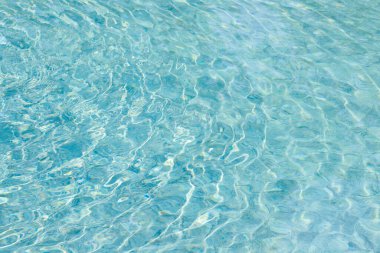 Yüzme havuzunda soyut mavi renk su dalgası arkaplan için saf doğal girdap desen dokusu kullanımı