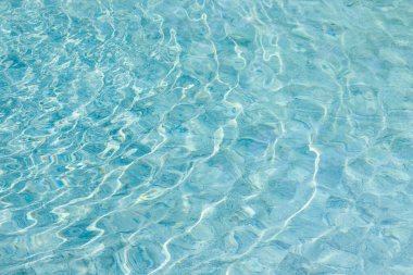 Yüzme havuzunda soyut mavi renk su dalgası arkaplan için saf doğal girdap desen dokusu kullanımı