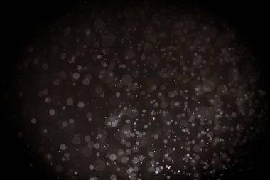 Siyah arkaplanı olan soyut siyah bokeh