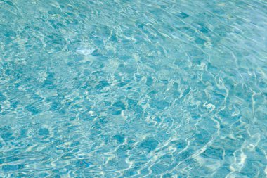 Yüzme havuzunda soyut mavi renk su dalgası arkaplan için saf doğal girdap desen dokusu kullanımı