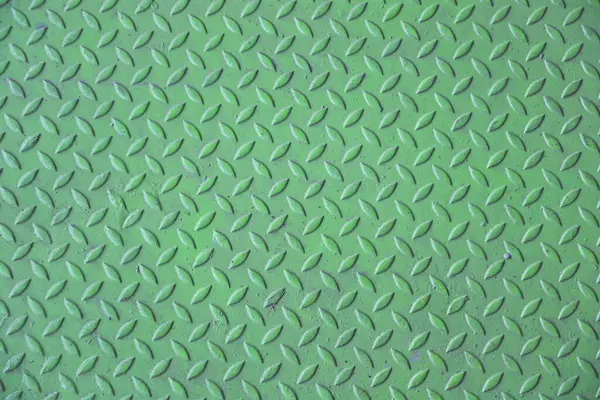 Yeşil elmas kaplama metal yüzey görünür aşınma ve çizikler