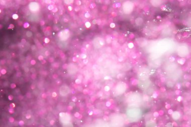 Siyah arkaplanı olan soyut pembe bokeh lüksü
