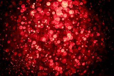 Görünür kırmızı noktalı bulanık fotoğraf, ışıl ışıl parlıyor. Duvar kağıdı olarak kullanılabilecek kadar lüks görünüyor.