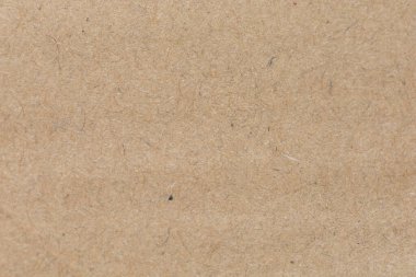 Eski kahverengi kağıt dokusunu kapat. Arkaplan resimleri veya reklamlar için dekorasyon olarak kullanılacak kağıt lifleri.