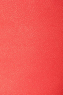 Kırmızı deri görünüm detayı ve dokusu arkaplan olarak kullanmak için uygun