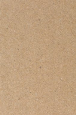 Eski kahverengi kağıt dokusunu kapat. Arkaplan resimleri veya reklamlar için dekorasyon olarak kullanılacak kağıt lifleri.