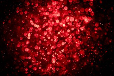 Görünür kırmızı noktalı bulanık fotoğraf, ışıl ışıl parlıyor. Duvar kağıdı olarak kullanılabilecek kadar lüks görünüyor.