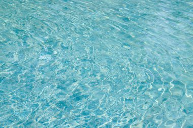 Yüzme havuzunda soyut mavi renk su dalgası arkaplan için saf doğal girdap desen dokusu kullanımı