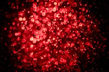 Görünür kırmızı noktalı bulanık fotoğraf, ışıl ışıl parlıyor. Duvar kağıdı olarak kullanılabilecek kadar lüks görünüyor.