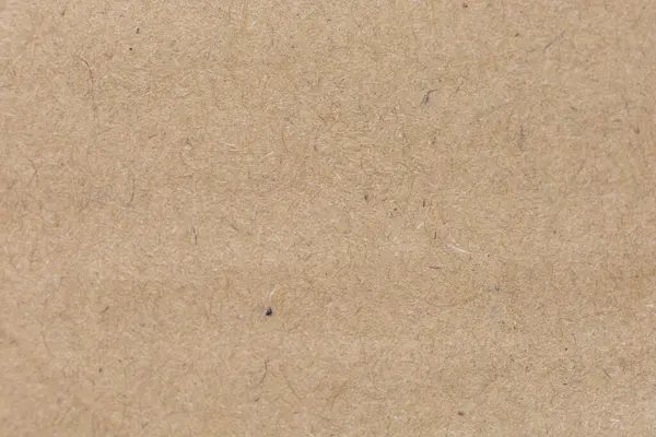 Eski kahverengi kağıt dokusunu kapat. Arkaplan resimleri veya reklamlar için dekorasyon olarak kullanılacak kağıt lifleri.