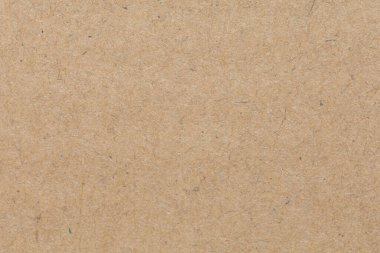 Eski kahverengi kağıt dokusunu kapat. Arkaplan resimleri veya reklamlar için dekorasyon olarak kullanılacak kağıt lifleri.