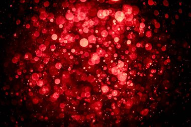 Görünür kırmızı noktalı bulanık fotoğraf, ışıl ışıl parlıyor. Duvar kağıdı olarak kullanılabilecek kadar lüks görünüyor.